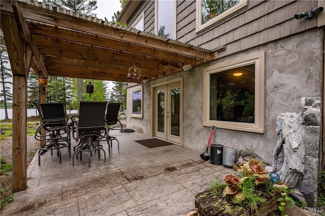 161 Portaferry Lake Dr, Pitcairn, NY 13648 - view of patio / terrace featuring french doors and outdoor dining space