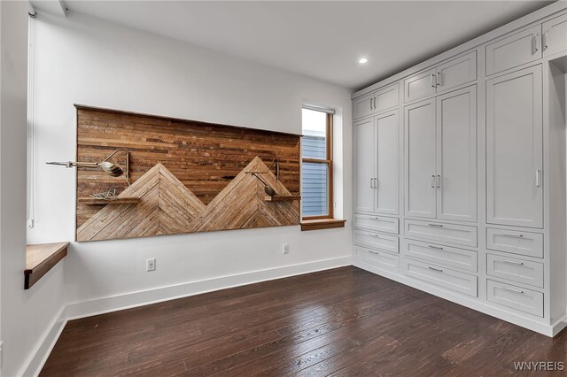 871 Seneca St, Buffalo, NY 14210 - unfurnished bedroom featuring dark wood-type flooring, baseboards, and recessed lighting