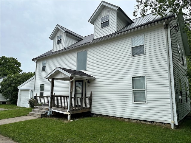 19 Hickory St, Hanover, NY 14136 - view of front of house with a front lawn, a garage, and an outdoor structure