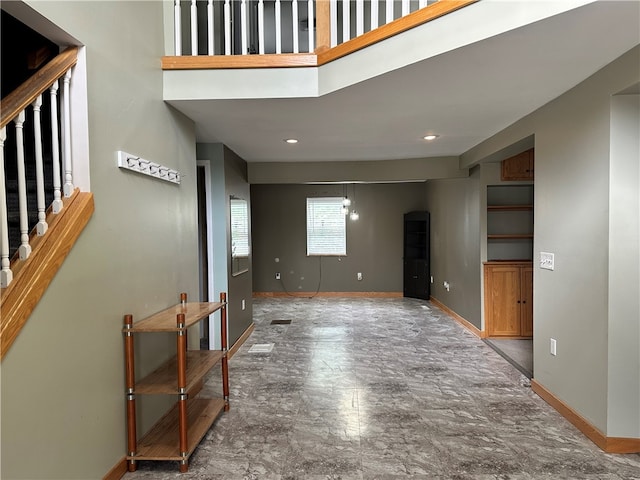 19 Hickory St, Hanover, NY 14136 - unfurnished living room with baseboards and stairs