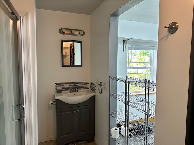 19 Hickory St, Hanover, NY 14136 - bathroom featuring vanity, baseboards, and an enclosed shower