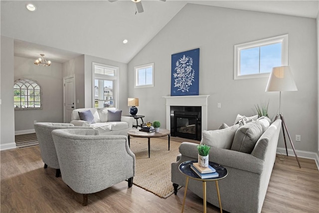 35 Chase Meadow Trl, Mendon, NY 14472 - living room with a ceiling fan, baseboards, wood finished floors, recessed lighting, and high vaulted ceiling