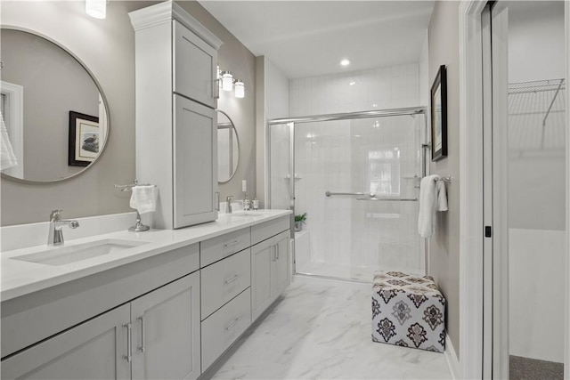 35 Chase Meadow Trl, Mendon, NY 14472 - full bath with double vanity, a stall shower, marble finish floors, recessed lighting, and a walk in closet