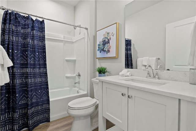 35 Chase Meadow Trl, Mendon, NY 14472 - bathroom featuring vanity, wood finished floors, toilet, and shower / bath combo with shower curtain