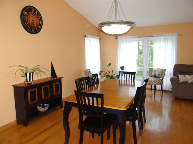 1737 Genesee Rd, Elmira, NY 14905 - dining room with light wood-type flooring and vaulted ceiling