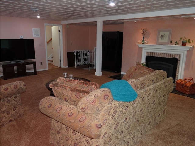 1737 Genesee Rd, Elmira, NY 14905 - carpeted living area with a fireplace, stairs, baseboards, and recessed lighting