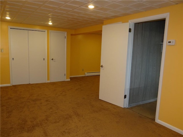 1737 Genesee Rd, Elmira, NY 14905 - unfurnished bedroom featuring a baseboard radiator, carpet, baseboards, two closets, and recessed lighting