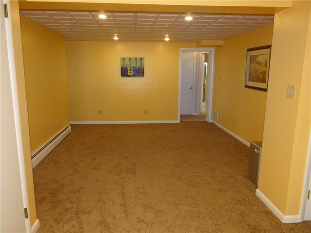 1737 Genesee Rd, Elmira, NY 14905 - below grade area with a baseboard radiator, recessed lighting, carpet flooring, and baseboards