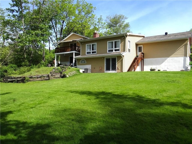 1737 Genesee Rd, Elmira, NY 14905 - rear view of property with a chimney, stairway, a yard, and a balcony
