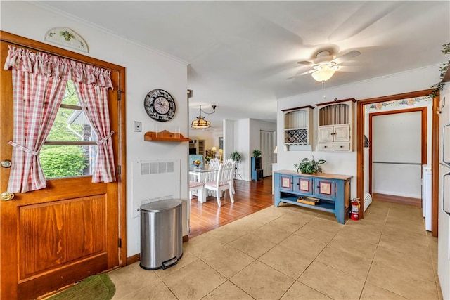63 Lakeview Dr N, Middlefield, NY 13326 - entryway featuring ceiling fan, ornamental molding, light tile patterned flooring, and baseboards