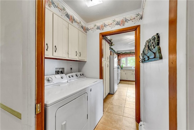63 Lakeview Dr N, Middlefield, NY 13326 - washroom featuring independent washer and dryer, cabinet space, and light tile patterned floors