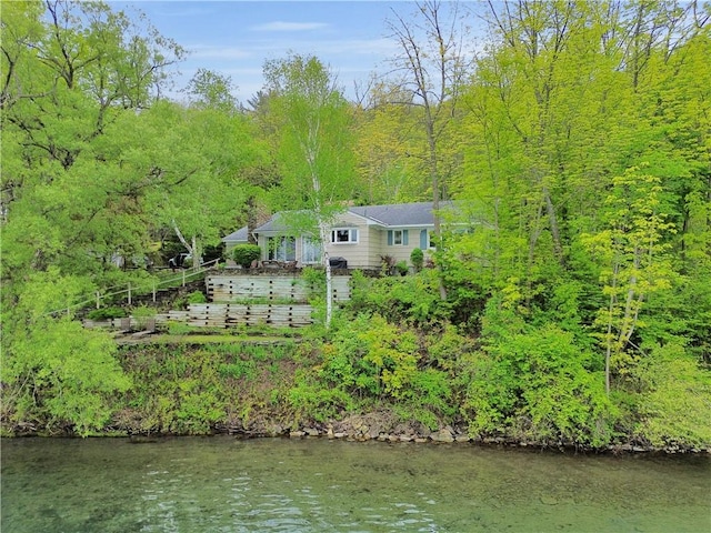 63 Lakeview Dr N, Middlefield, NY 13326 - water view featuring a heavily wooded area