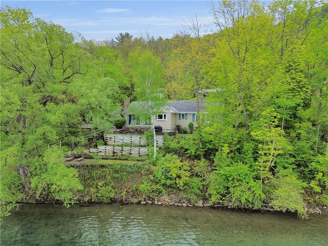 63 Lakeview Dr N, Middlefield, NY 13326 - aerial view of property and surrounding area featuring a nearby body of water and a forest