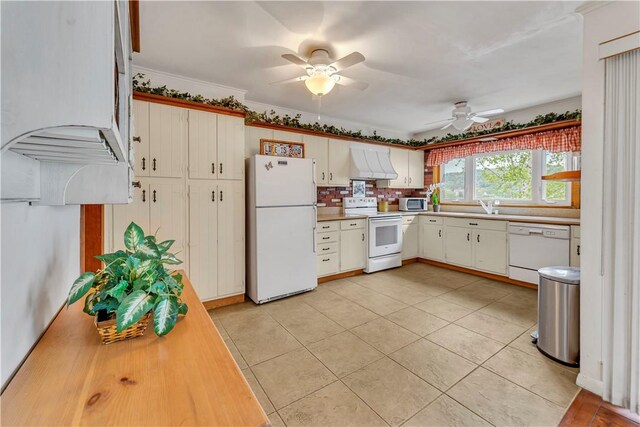 63 Lakeview Dr N, Middlefield, NY 13326 - kitchen featuring white appliances, a ceiling fan, a sink, and light countertops