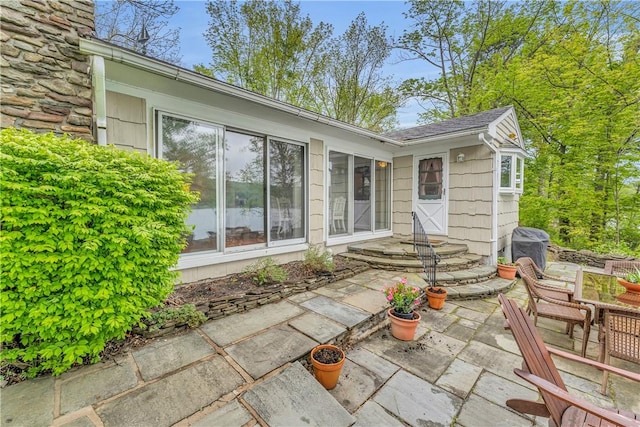 63 Lakeview Dr N, Middlefield, NY 13326 - rear view of house featuring a patio area and roof with shingles