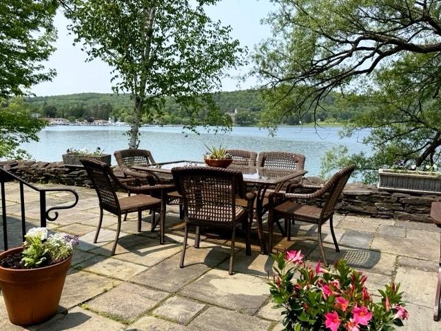 63 Lakeview Dr N, Middlefield, NY 13326 - view of patio with a water view and outdoor dining space