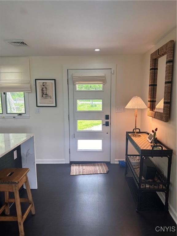 2089 Spring St, Hamilton, NY 13346 - doorway to outside featuring baseboards and recessed lighting