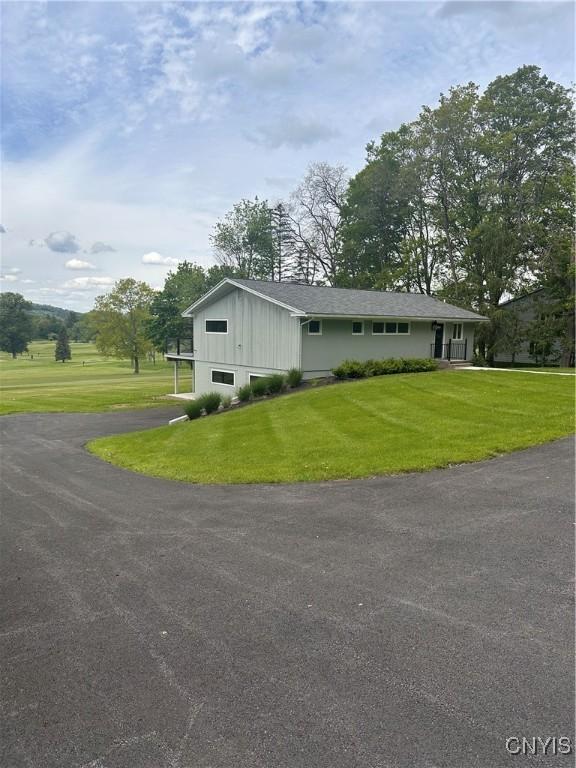 2089 Spring St, Hamilton, NY 13346 - view of front of house with a front yard and asphalt driveway