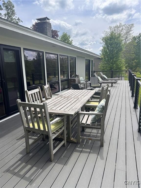 2089 Spring St, Hamilton, NY 13346 - wooden deck with outdoor dining area