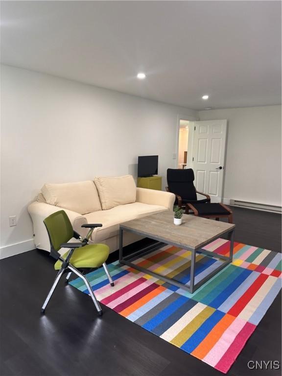 2089 Spring St, Hamilton, NY 13346 - living area with baseboard heating, recessed lighting, wood finished floors, and baseboards