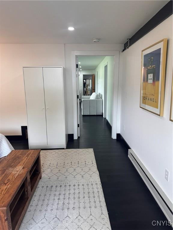 2089 Spring St, Hamilton, NY 13346 - hall featuring baseboard heating, recessed lighting, and dark wood finished floors