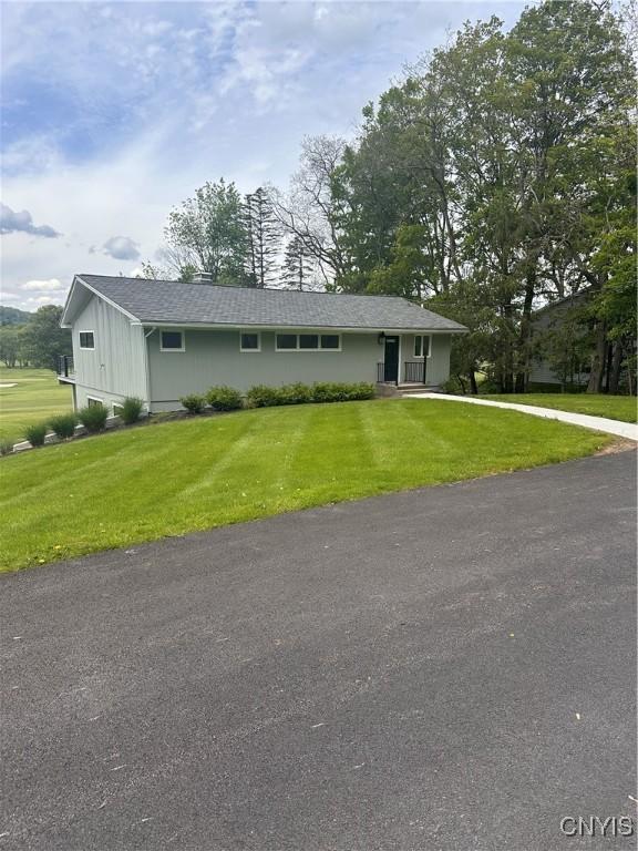 2089 Spring St, Hamilton, NY 13346 - single story home featuring a front yard