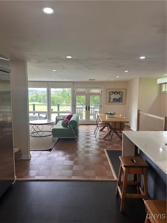 2089 Spring St, Hamilton, NY 13346 - living area with plenty of natural light, french doors, and recessed lighting