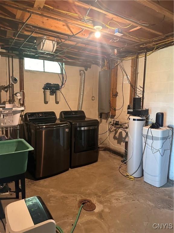 2089 Spring St, Hamilton, NY 13346 - basement with washing machine and dryer, electric panel, a sink, and a water softener