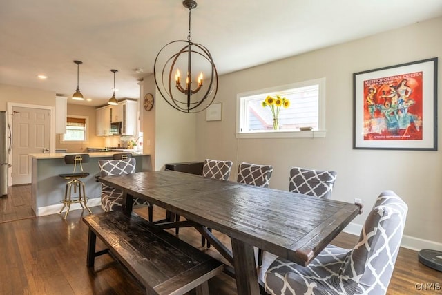 207 Twin Hills Dr, Syracuse, NY 13207 - dining area with a chandelier, plenty of natural light, dark wood-style flooring, and recessed lighting