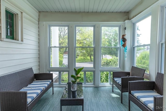 207 Twin Hills Dr, Syracuse, NY 13207 - sunroom featuring wood finished floors and wooden walls