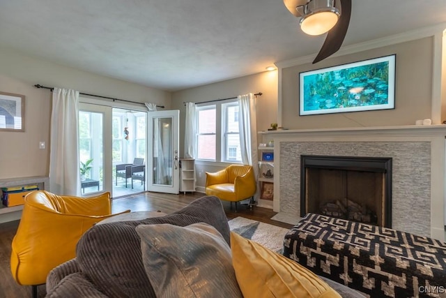 207 Twin Hills Dr, Syracuse, NY 13207 - living area featuring a fireplace with flush hearth, wood finished floors, and ornamental molding