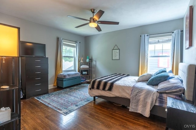 207 Twin Hills Dr, Syracuse, NY 13207 - bedroom with dark wood finished floors and a ceiling fan