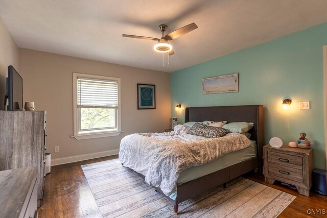 207 Twin Hills Dr, Syracuse, NY 13207 - bedroom with dark wood-type flooring, baseboards, and a ceiling fan