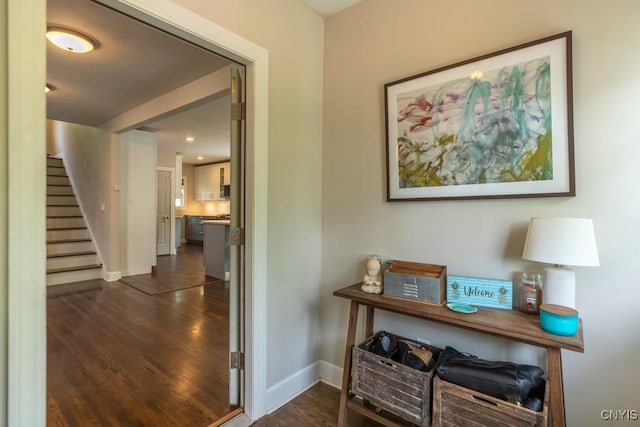 207 Twin Hills Dr, Syracuse, NY 13207 - hallway with stairs, dark wood finished floors, baseboards, and recessed lighting