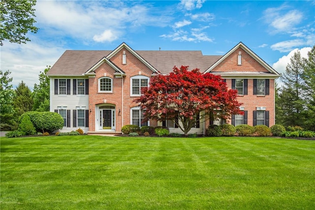 55 Meadow Cove Rd, Pittsford, NY 14534 - colonial house featuring brick siding and a front yard