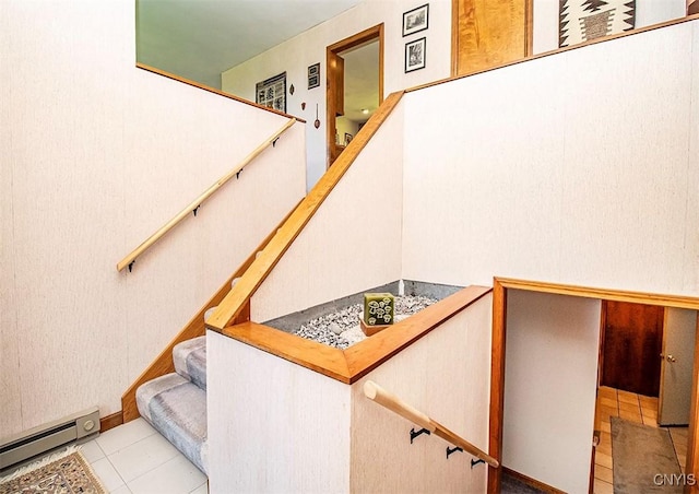 6010 E Lake Rd, Sullivan, NY 13035 - stairs featuring a baseboard radiator and tile patterned floors
