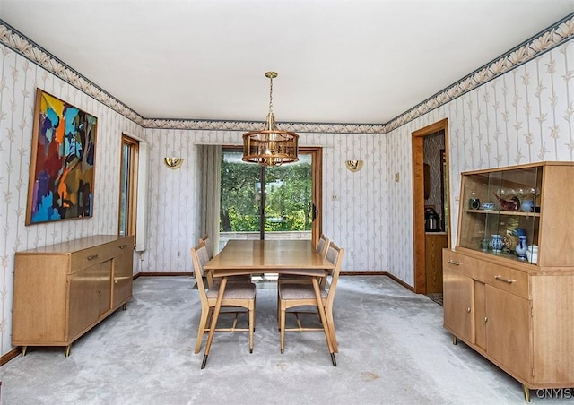 6010 E Lake Rd, Sullivan, NY 13035 - dining room with wallpapered walls, a chandelier, baseboards, and light colored carpet