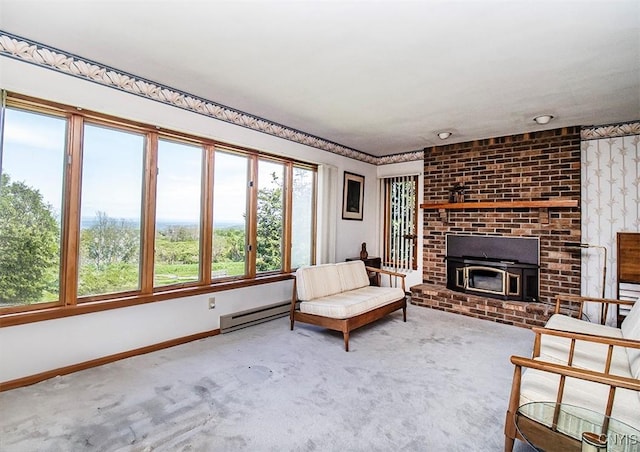 6010 E Lake Rd, Sullivan, NY 13035 - carpeted living area featuring a baseboard heating unit, baseboards, and a fireplace