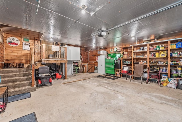 8311 State Route 415, Campbell, NY 14821 - garage with a garage door opener and wooden walls