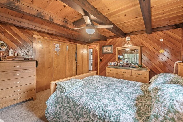 8311 State Route 415, Campbell, NY 14821 - carpeted bedroom featuring wooden ceiling with exposed beams and wooden walls