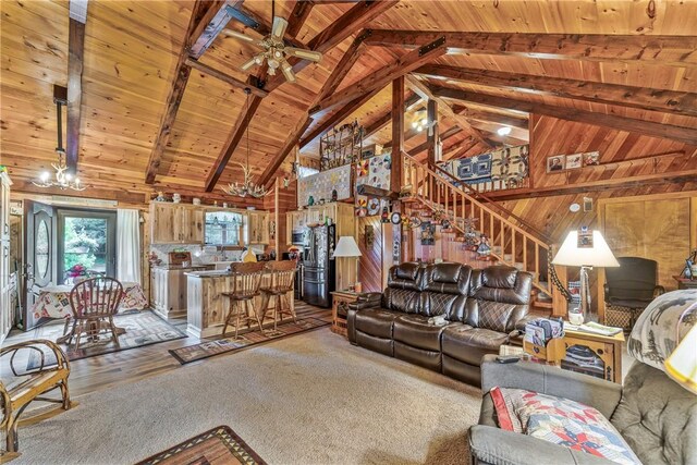 8311 State Route 415, Campbell, NY 14821 - living room with wooden ceiling with exposed beams, light wood-type flooring, wooden walls, high vaulted ceiling, and ceiling fan