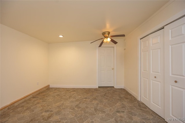 445 Connecticut St, Buffalo, NY 14213 - unfurnished bedroom featuring stone flooring, a closet, recessed lighting, baseboards, and ceiling fan
