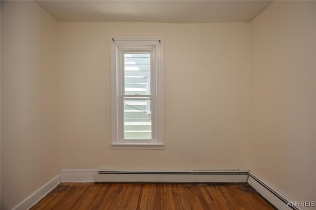 445 Connecticut St, Buffalo, NY 14213 - empty room featuring plenty of natural light, a baseboard radiator, baseboards, and dark wood-style flooring