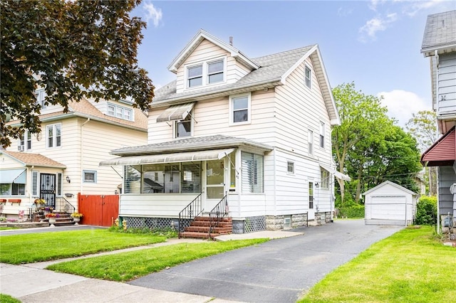 40 Mcnaughton St, Rochester, NY 14606 - traditional style home featuring entry steps, an outbuilding, a front lawn, and a garage