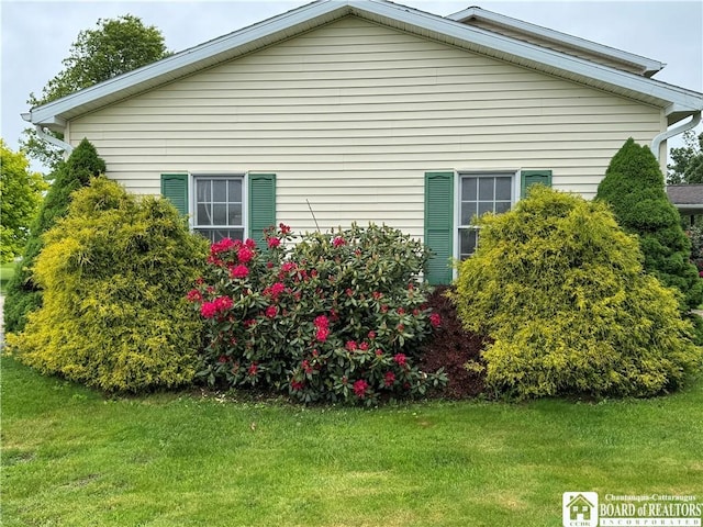 8900 Brownell Rd, Clymer, NY 14724 - view of property exterior with a yard