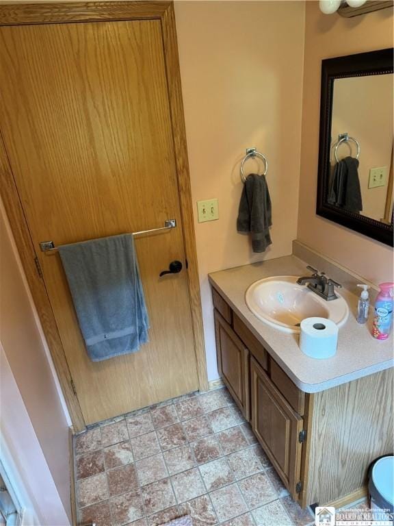 8900 Brownell Rd, Clymer, NY 14724 - bathroom with vanity and stone finish floors