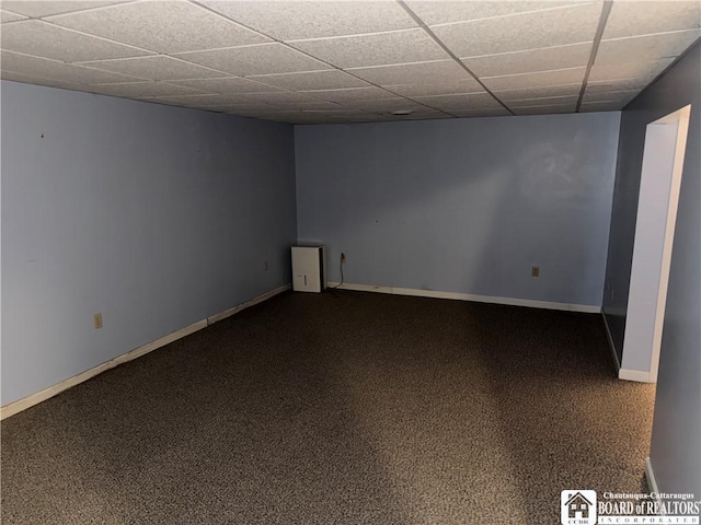 8900 Brownell Rd, Clymer, NY 14724 - empty room with baseboards, a drop ceiling, and dark carpet