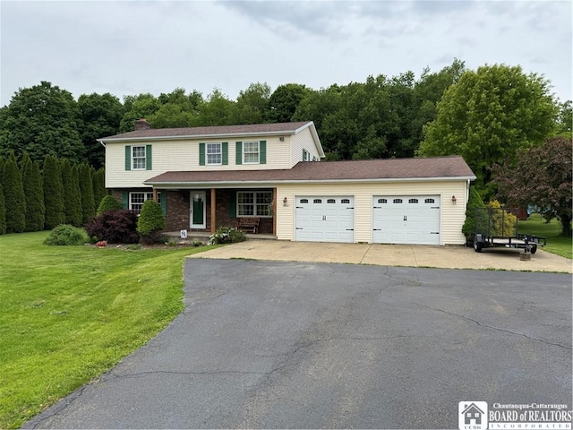 8900 Brownell Rd, Clymer, NY 14724 - traditional-style house with an attached garage, a front yard, a chimney, asphalt driveway, and a porch