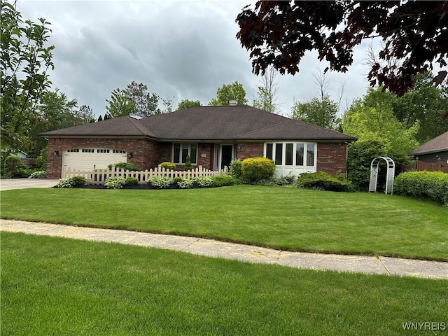 55 Hemlock Ln, Lancaster, NY 14086 - single story home with an attached garage, a front yard, brick siding, and concrete driveway