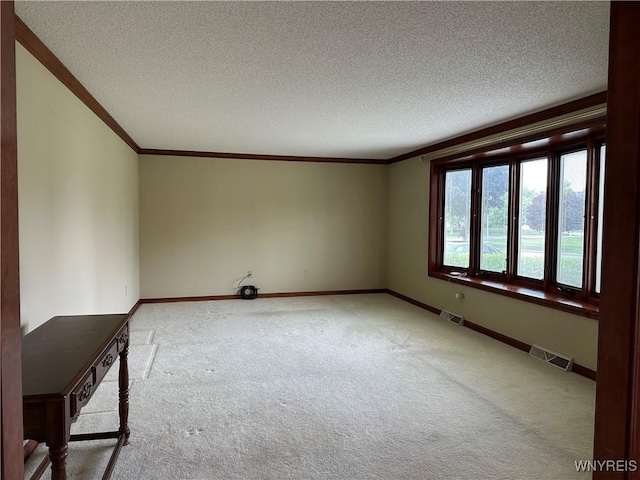 55 Hemlock Ln, Lancaster, NY 14086 - empty room featuring ornamental molding, light carpet, baseboards, and a textured ceiling